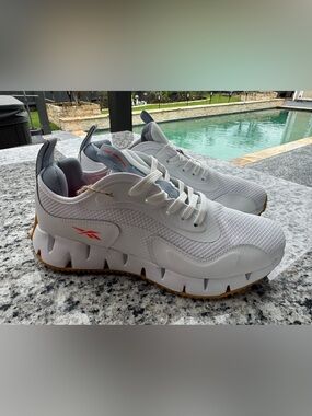 Reebok White and Gray Trail Runner with Orange Logo Accent